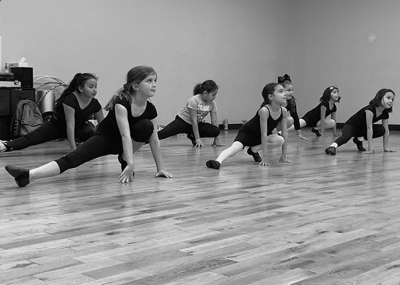 A Group of Childs Doing a Dance Exercise