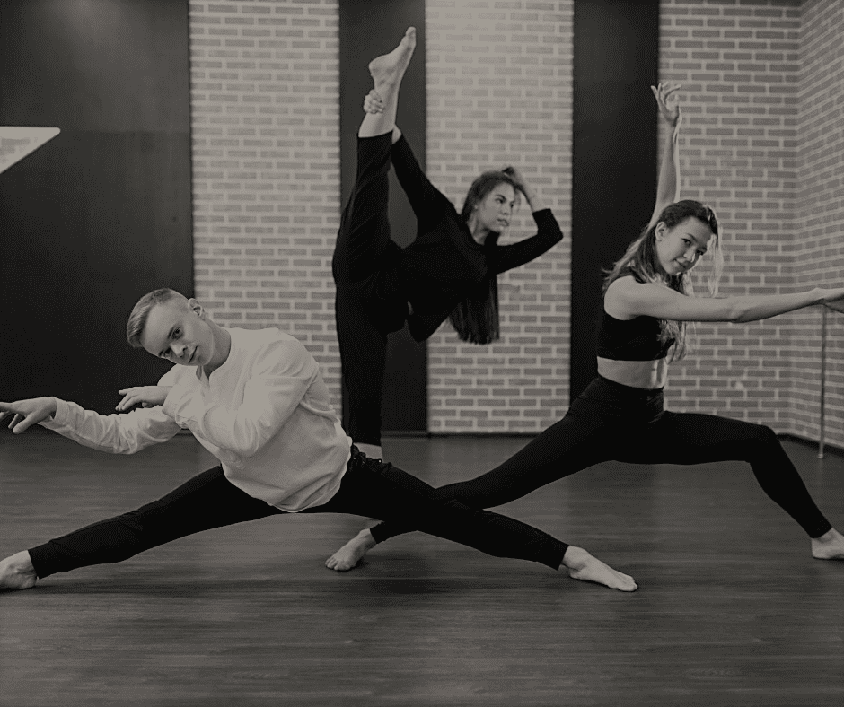 A Group of People Doing a Dance Pose